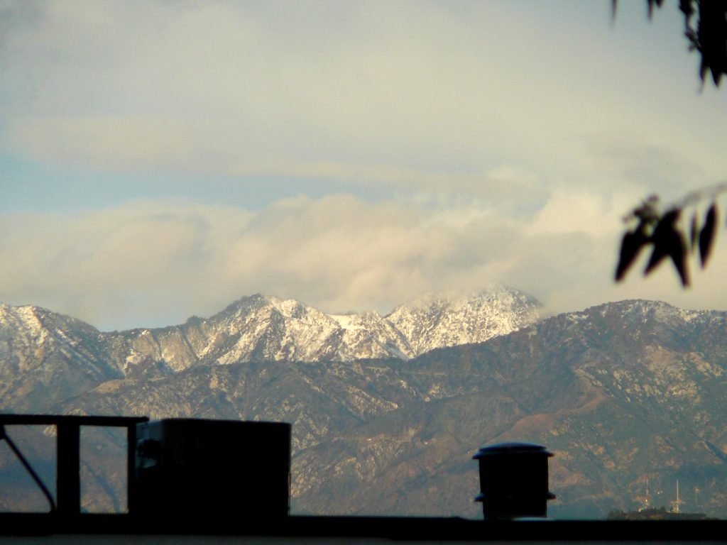 snow on whatever ski mountain this is, towards Pasadena